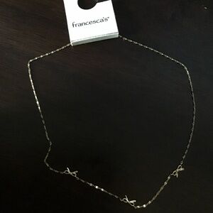 GOLD MINI BOWS NECKLACE